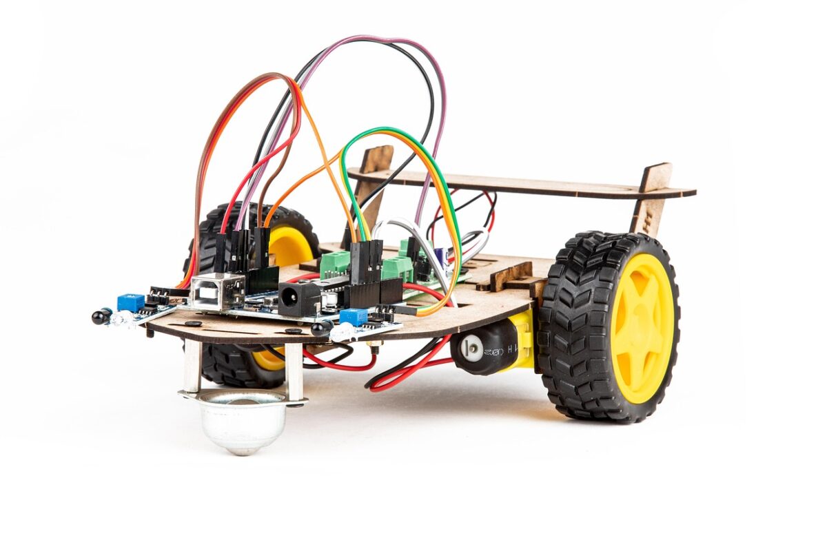 Children working together around a coding robot